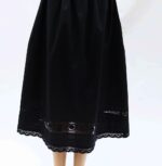 black cotton petticoat adorned with hand made lace trims and pleats