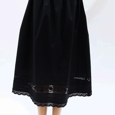 black cotton petticoat adorned with hand made lace trims and pleats