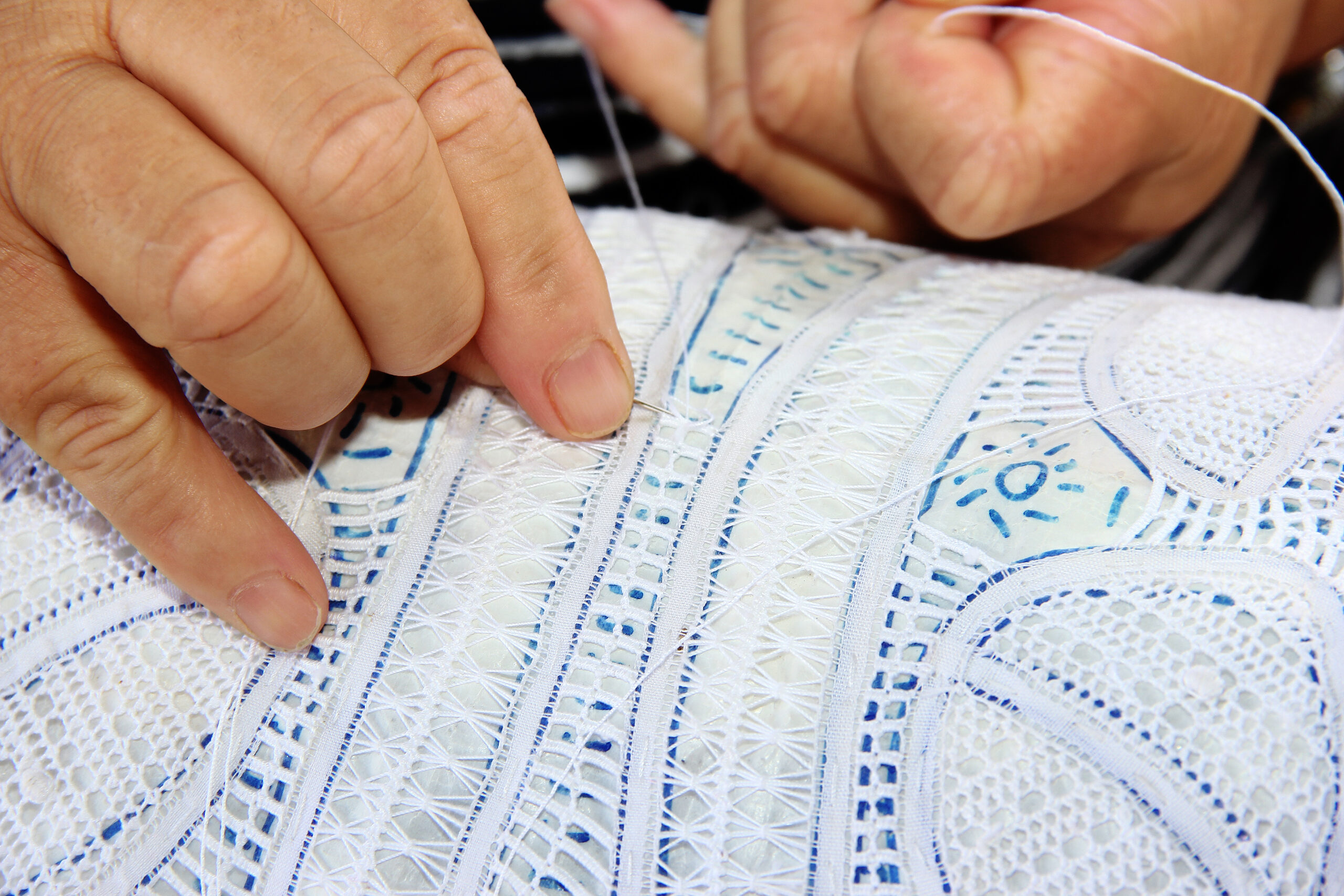 About Us 1 Lacemaker Making Lace