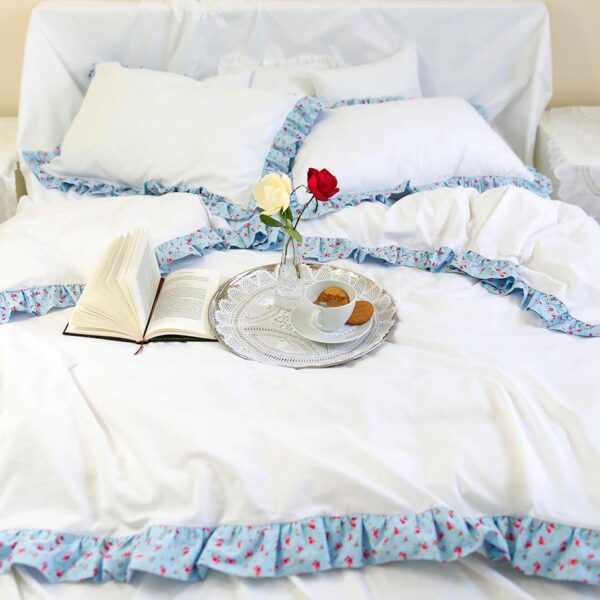 white cotton duvet cover adorned with floral double-faced ruffles