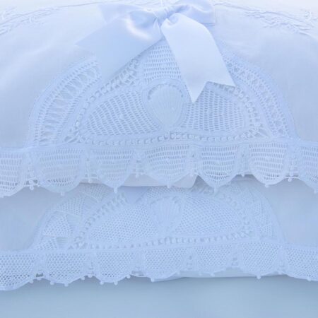 white cotton pillowcases embellished with handmade lace trims and hand embroidery
