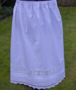 White Cotton Petticoat with a Mix of Machine Made and Handmade Lace Trims round the bottom and on the hem and pin tucks
