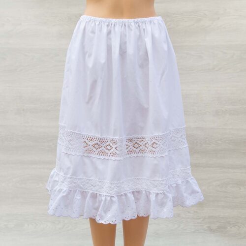 white cotton petticoat adorned with Broderie Anglaise, lace trims and pleats