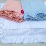 Cotton Pillowcases with Ruffles all around them in colours white, baby pink or baby blue