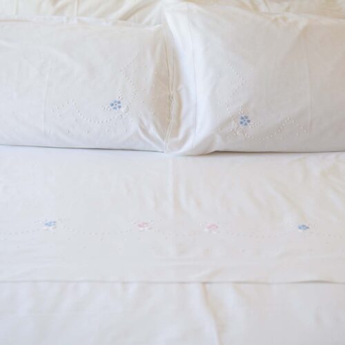 white cotton flat sheet with two matching pillowcases hand embroidered in Portugal
