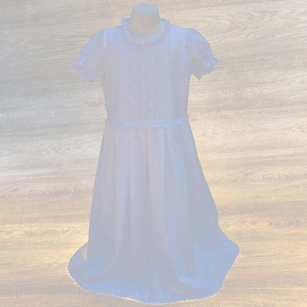 pristine white cotton girl holy communion dress embellished with gorgeous handmade lace trims