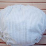 bespoke white cotton girls women frilly knickers bloomers adorned with lace trims, several pin tucks on the front and side bows