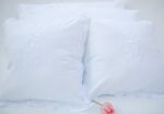white cotton cushion covers hand embroidered embellished with handmade lace trims